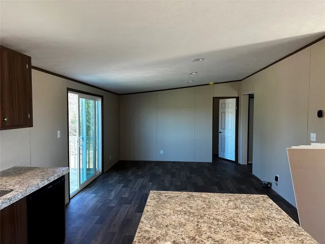 wooden floor in a hall with an entryway