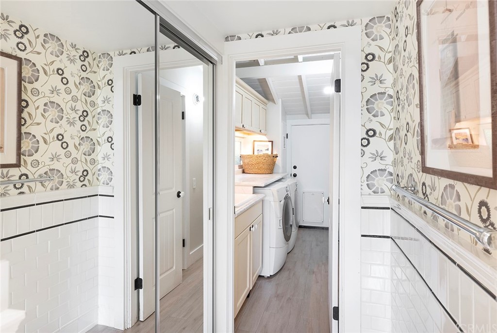 151 Rockledge Terrace Laguna Beach, CA 92651 - Photo 12 of 24 a bathroom with a bathtub and a shower