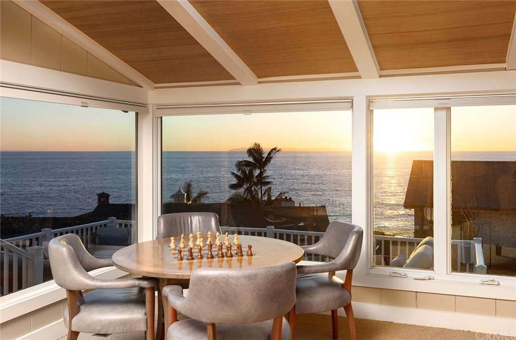 151 Rockledge Terrace Laguna Beach, CA 92651 - Photo 16 of 24 a view of a dining room with furniture and window