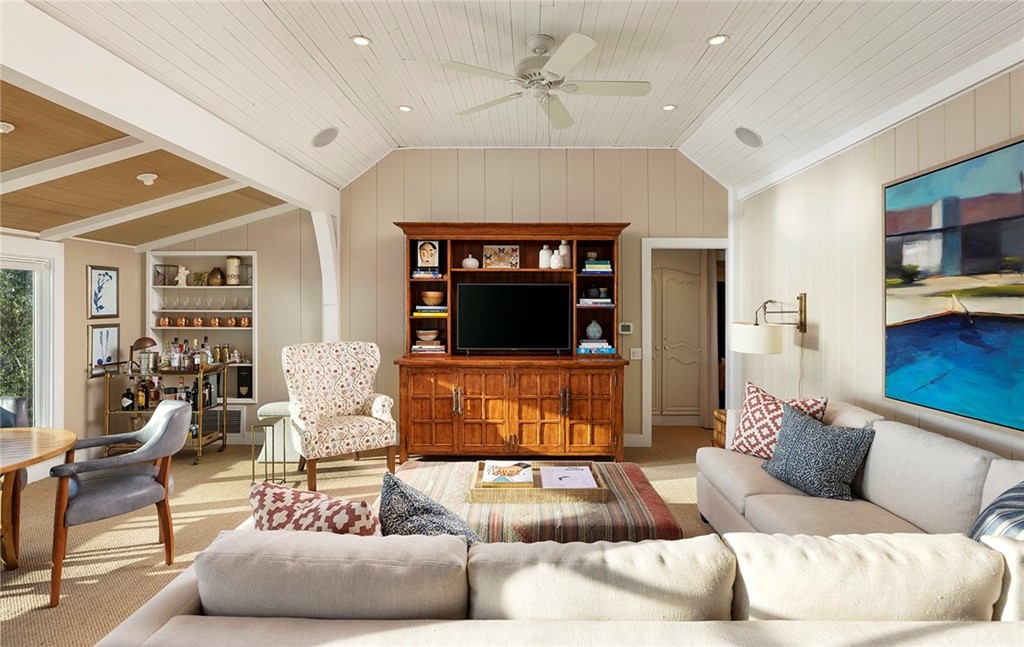 151 Rockledge Terrace Laguna Beach, CA 92651 - Photo 5 of 24 a living room with furniture and a flat screen tv