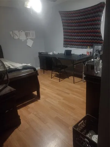 a kitchen with stainless steel appliances granite countertop white cabinets sink and granite counter tops