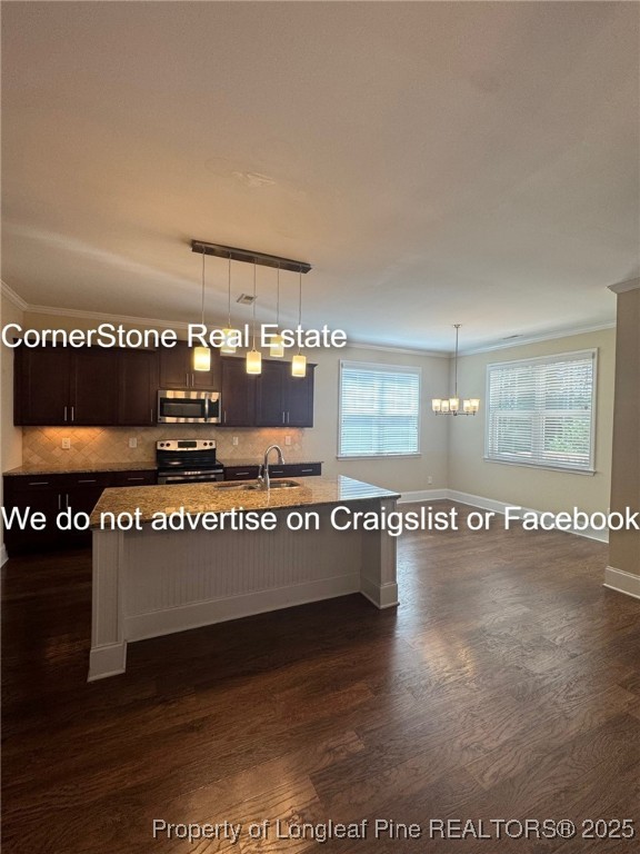 547 Micahs Way North Spring Lake, NC 28390 - Photo 15 of 26 a view of a big room with wooden floor