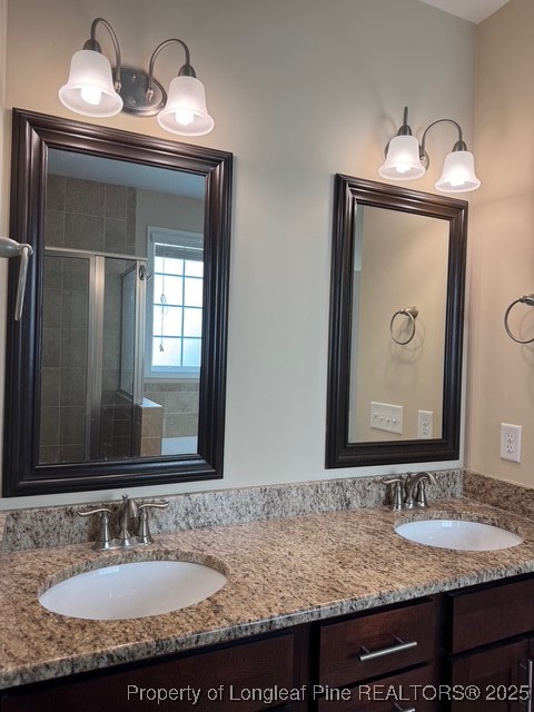 547 Micahs Way North Spring Lake, NC 28390 - Photo 22 of 26 a bathroom with sink and mirror