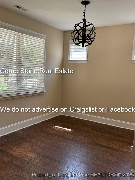 547 Micahs Way North Spring Lake, NC 28390 - Photo 6 of 26 a view of a kitchen with granite countertop a stove and a large window