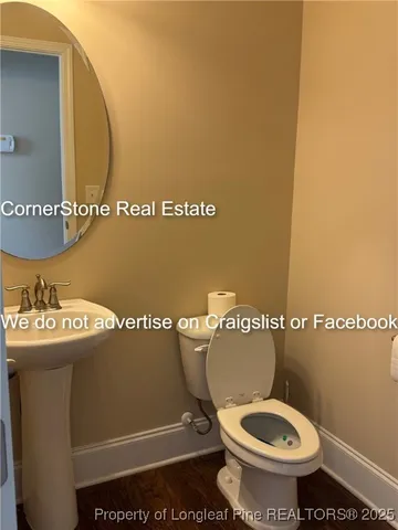 a bathroom with a toilet