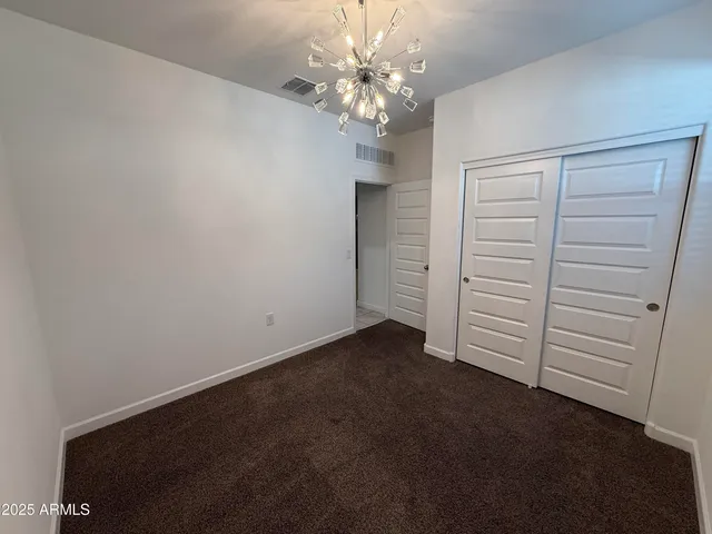 a view of a room with a fan