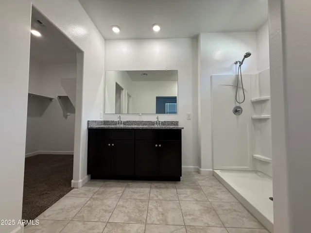 an empty room with a bench