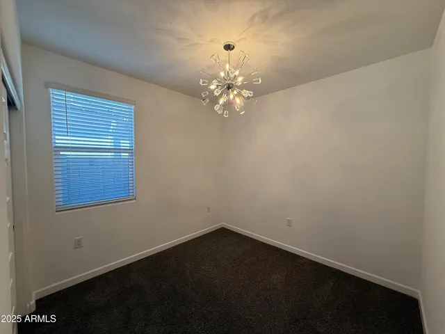 a view of a hallway with closet
