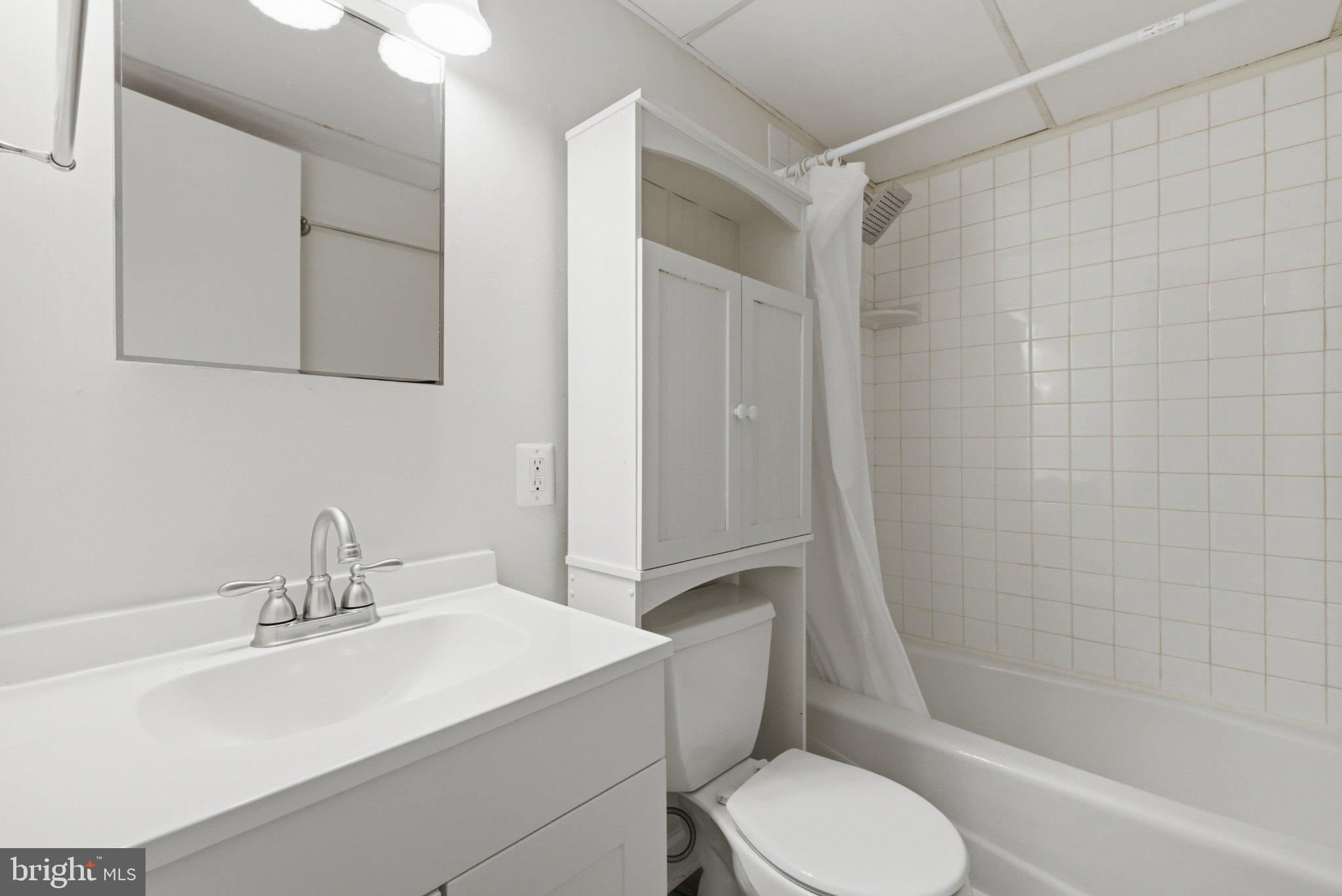 11492 Rawhide Road Lusby, MD 20657 - Photo 16 of 20 Modern bathroom with clean lines.