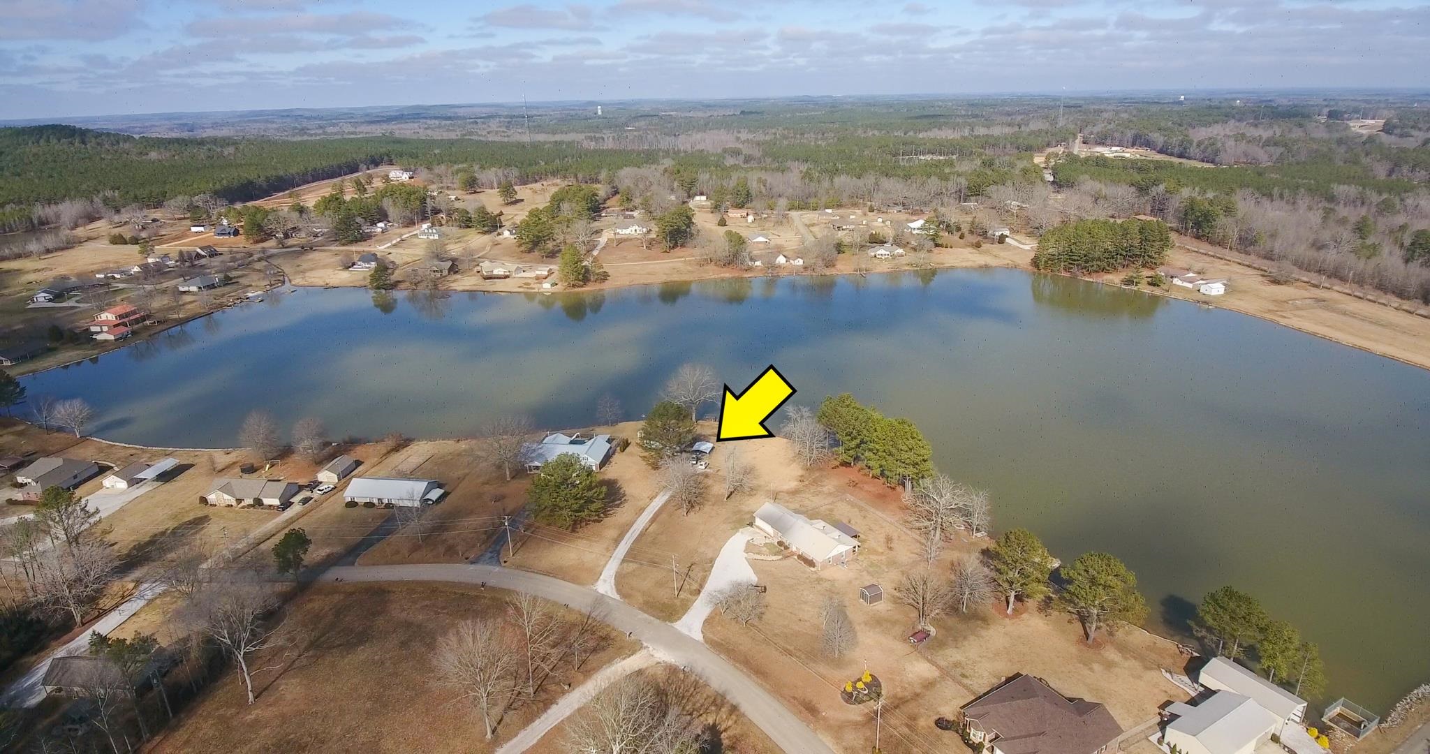 32 County Road 178 Iuka, MS 38852 - Photo 2 of 16 an aerial view of a house with a lake