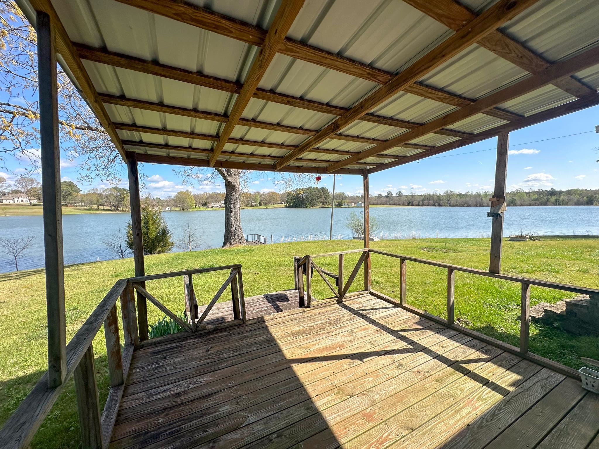 32 County Road 178 Iuka, MS 38852 - Photo 10 of 16 a view of a balcony with wooden floor