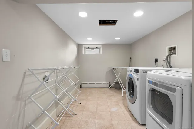 a view of utility room with washer and dryer