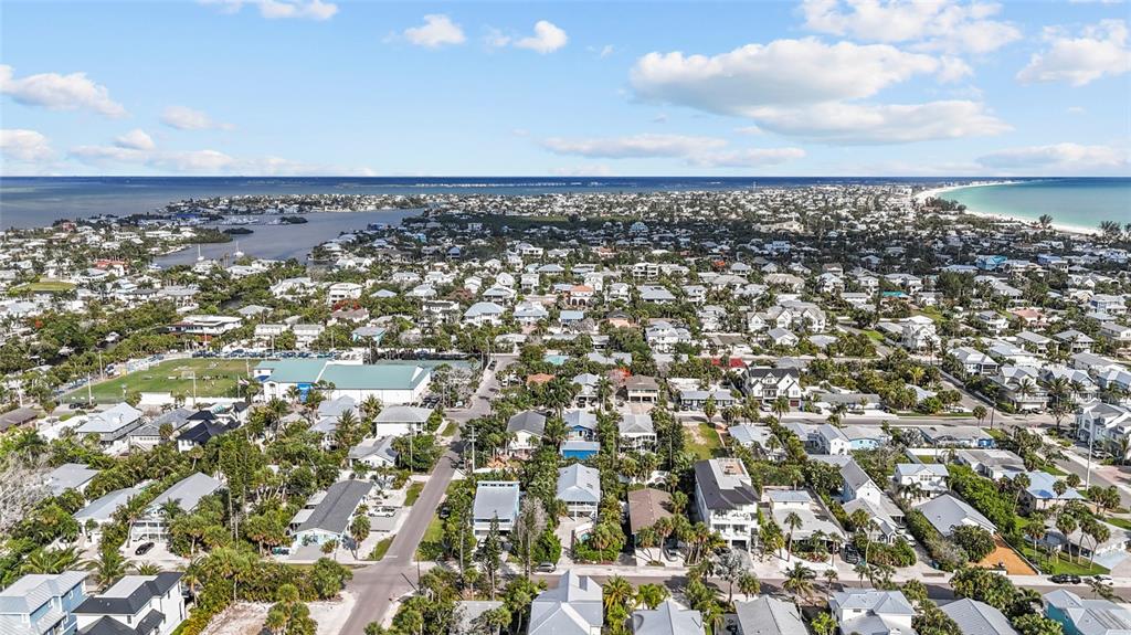 315 Spring Avenue Anna Maria, FL 34216 - Photo 57 of 63 an aerial view of multiple house