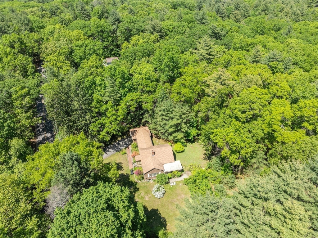38 Rutland Street Carlisle, MA 01741 - Photo 15 of 18 an aerial view of residential house with outdoor space and trees around