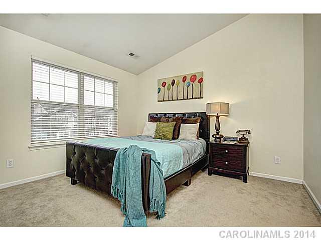 918 Azurine Circle, Unit 918 Fort Mill, SC 29708 - Photo 15 of 15 a bed room with a bed and a window