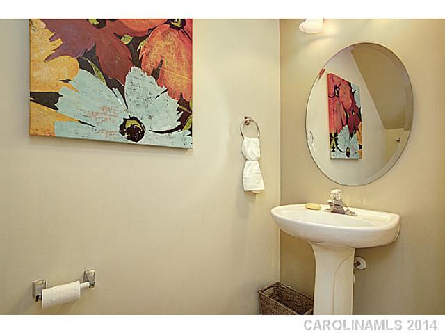 918 Azurine Circle, Unit 918 Fort Mill, SC 29708 - Photo 8 of 15 a bathroom with a sink and mirror