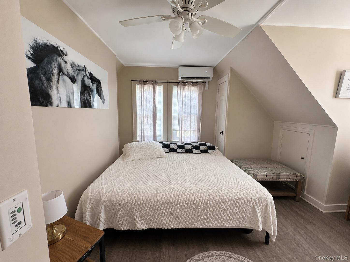 90 Orchard Road, Unit 2 Mahopac, NY 10541 - Photo 2 of 7 a bedroom with a bed and window