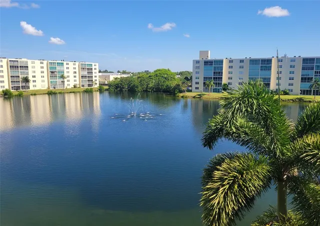 a view of a city with a lake