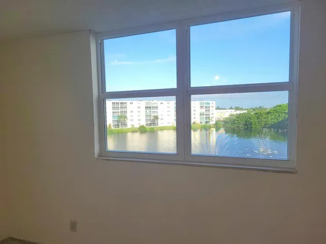 a view of a room that has a window