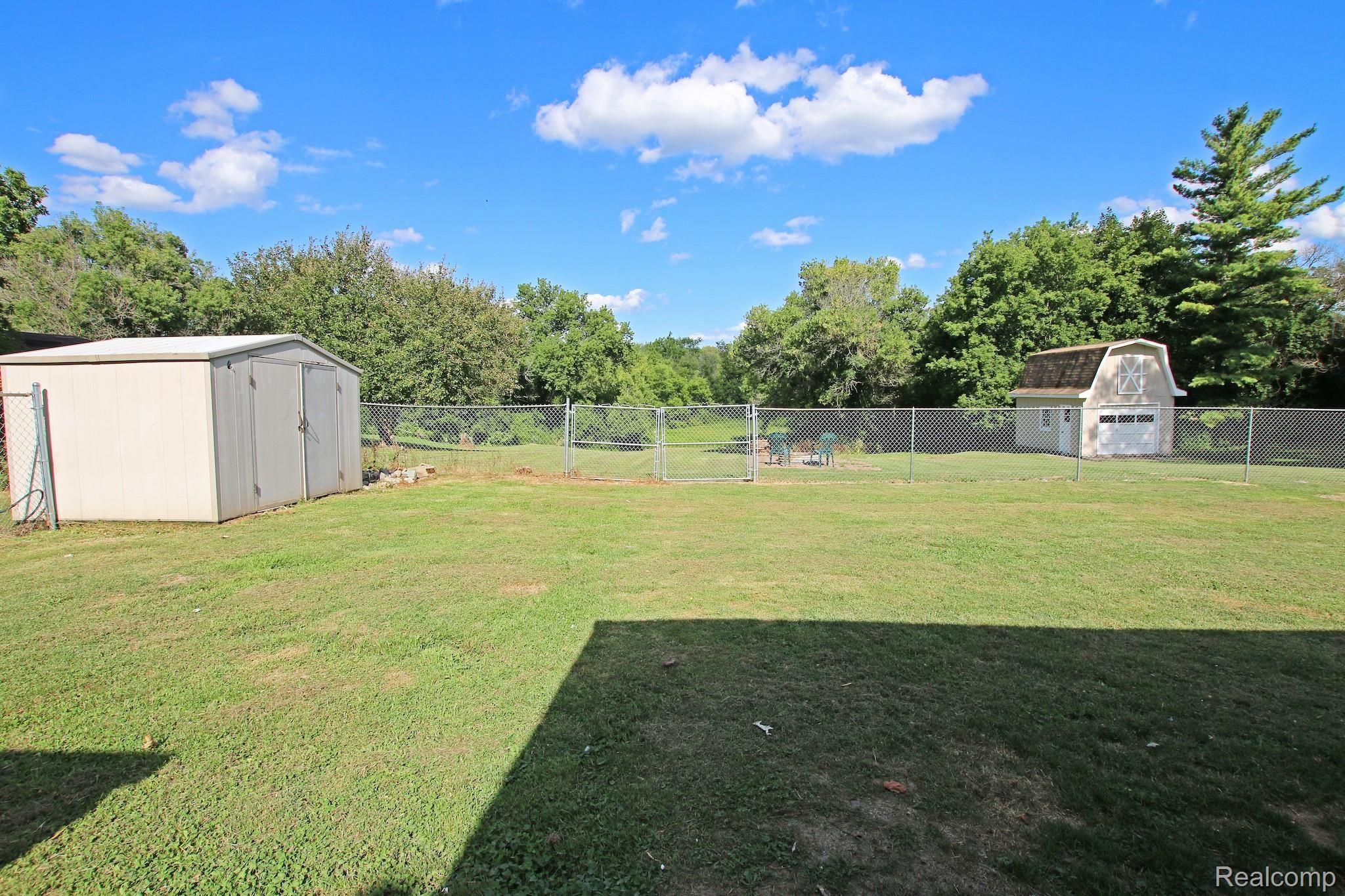 4327 South State Road Davison, MI 48423 - Photo 54 of 68 Fenced Backyard