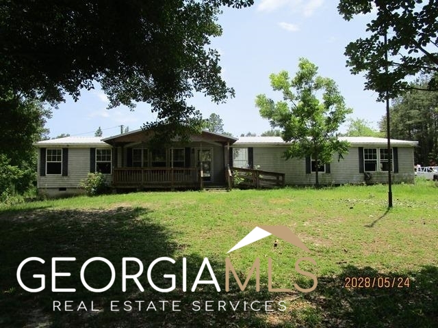 1331 Edsel Senn Road Rockledge, GA 30454 - Photo 1 of 1 a view of a house with a backyard