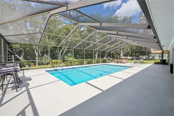 $599,900 | 4603 Lake In The Woods Drive, Spring Hill, FL 34607