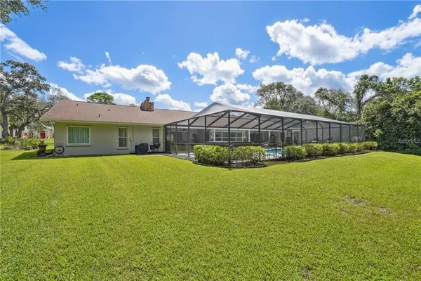 $599,900 | 4603 Lake In The Woods Drive, Spring Hill, FL 34607
