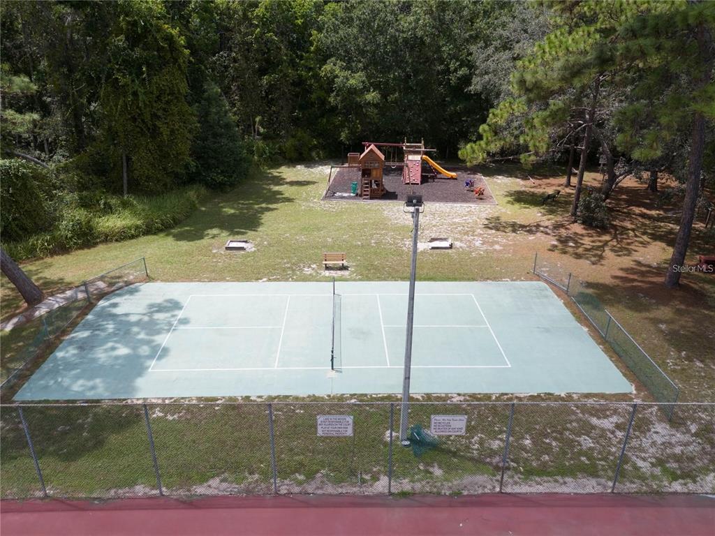 4603 Lake In The Woods Drive Spring Hill, FL 34607 - Photo 30 of 69 a view of a swimming pool