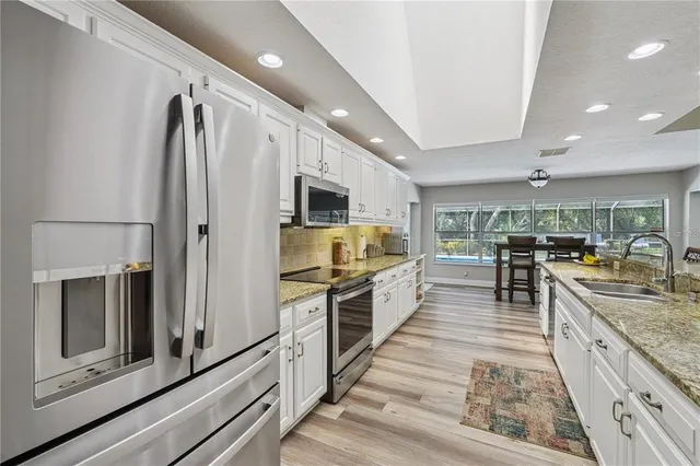 $650,000 | 4603 Lake In The Woods Drive, Spring Hill, FL 34607