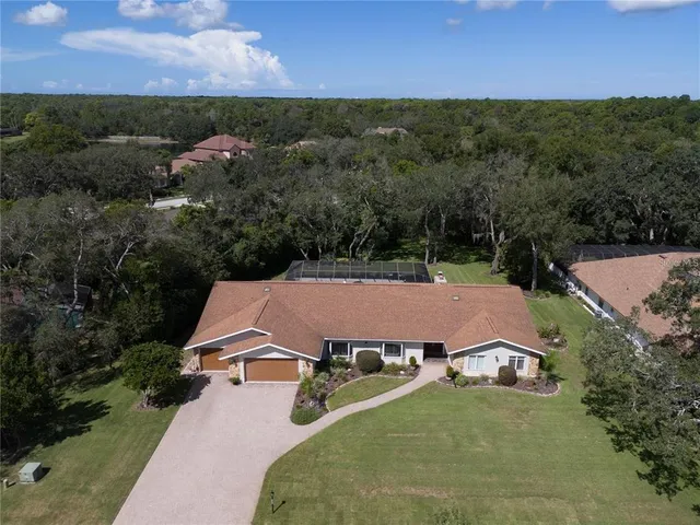 $650,000 | 4603 Lake In The Woods Drive, Spring Hill, FL 34607