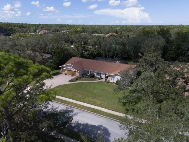 $650,000 | 4603 Lake In The Woods Drive, Spring Hill, FL 34607