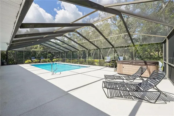 $599,900 | 4603 Lake In The Woods Drive, Spring Hill, FL 34607