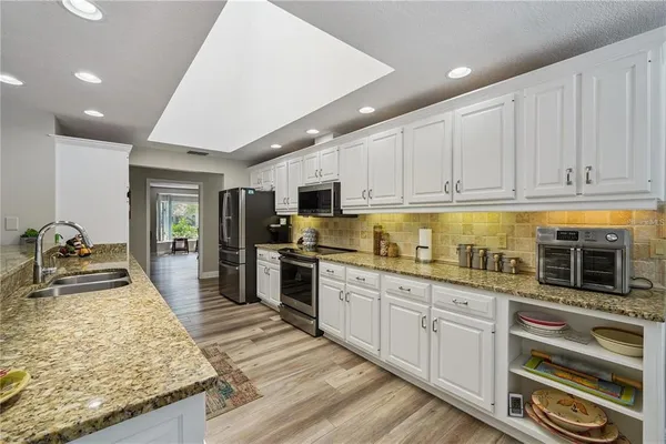 $599,900 | 4603 Lake In The Woods Drive, Spring Hill, FL 34607