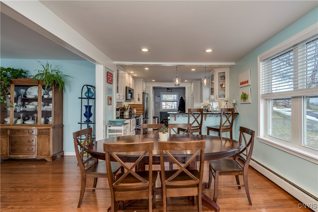 26995 3 Mile Point Road Lyme, NY 13622 - Photo 11 of 48 Dining room open to kitchen & living room