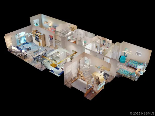 a bed sitting in a bedroom next to a lamp