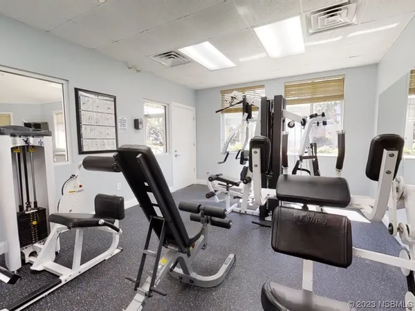 a view of a room with gym equipment