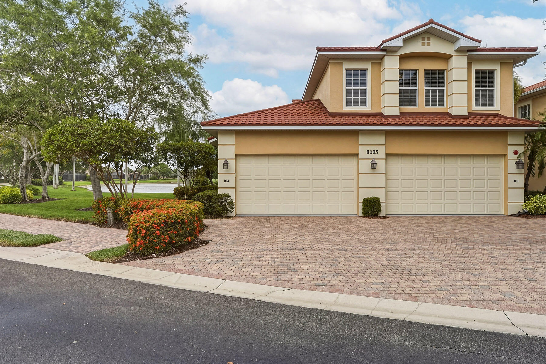 8605 Champions Point, Unit 103 Naples, FL 34113 - Photo 39 of 44 a house with a outdoor space