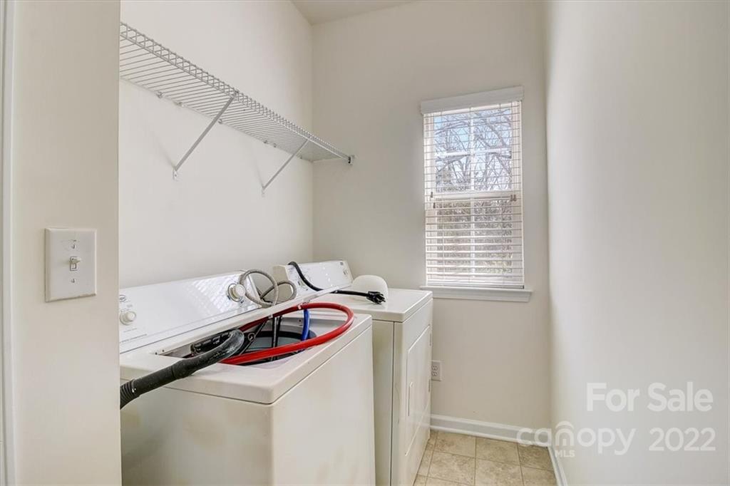 11223 Winget Pond Road Charlotte, NC 28278 - Photo 21 of 43 a utility room with dryer and washer