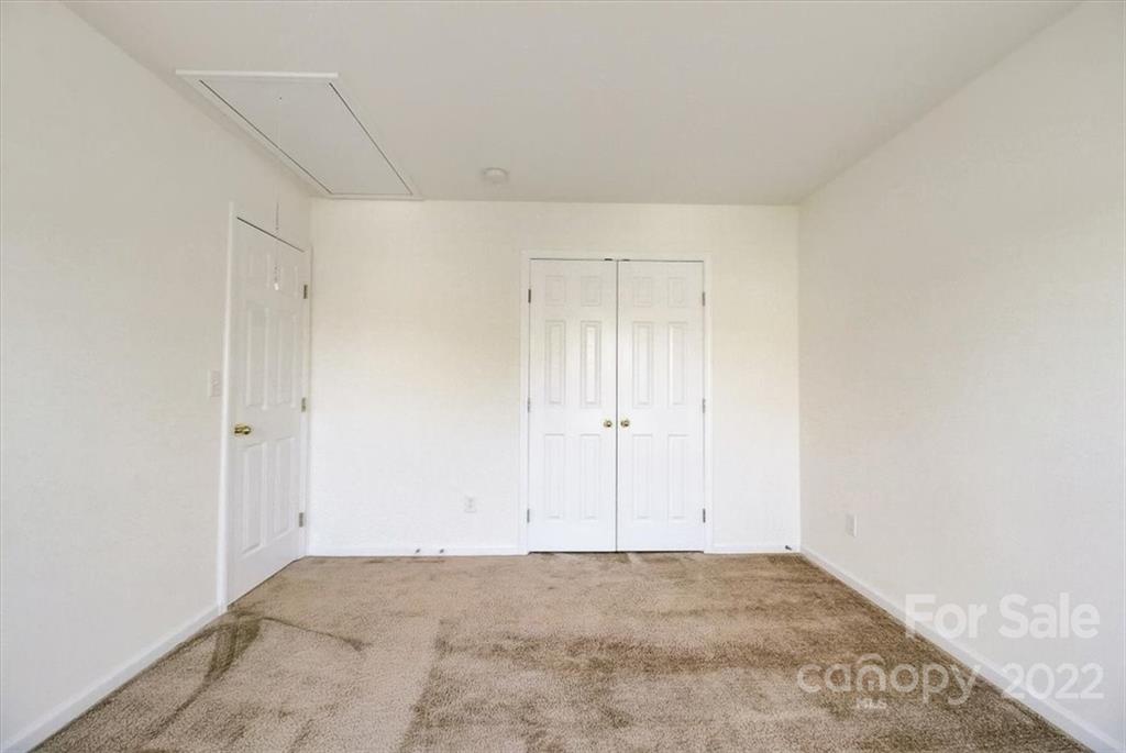 11223 Winget Pond Road Charlotte, NC 28278 - Photo 28 of 43 a view of an empty room