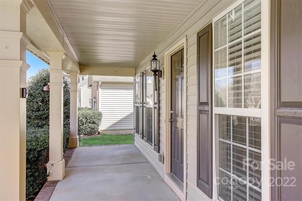11223 Winget Pond Road Charlotte, NC 28278 - Photo 3 of 43 a view of a porch with a window
