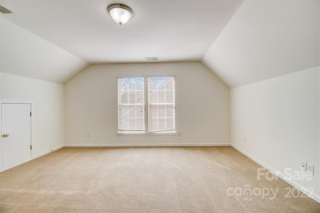11223 Winget Pond Road Charlotte, NC 28278 - Photo 36 of 43 an empty room with a window