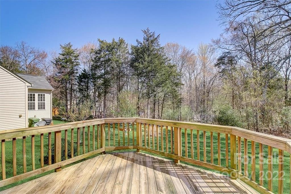 11223 Winget Pond Road Charlotte, NC 28278 - Photo 40 of 43 a view of balcony with wooden floor and fence
