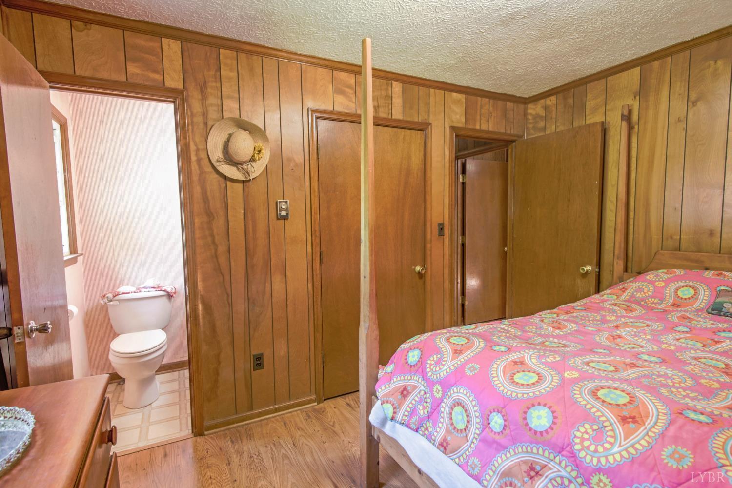1494 Buffalo Mill Road Evington, VA 24550 - Photo 33 of 75 a bathroom with a sink and a mirror
