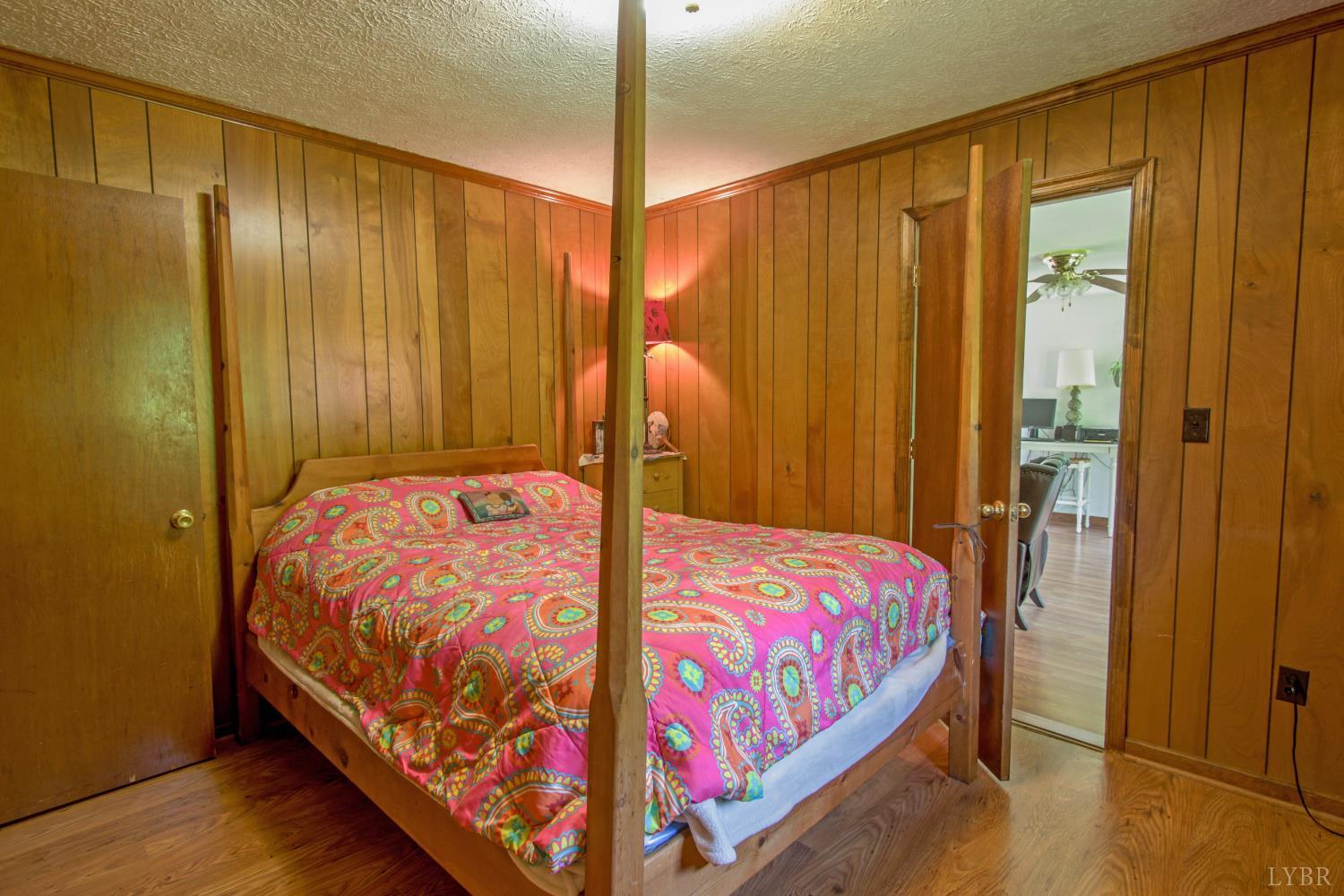 1494 Buffalo Mill Road Evington, VA 24550 - Photo 35 of 75 a bedroom with a bed and a dresser