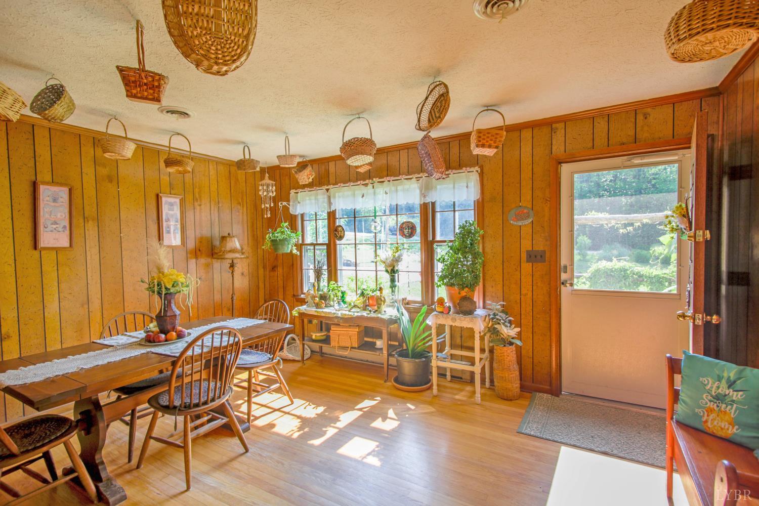1494 Buffalo Mill Road Evington, VA 24550 - Photo 5 of 75 a view of a dining room with furniture window and outside view