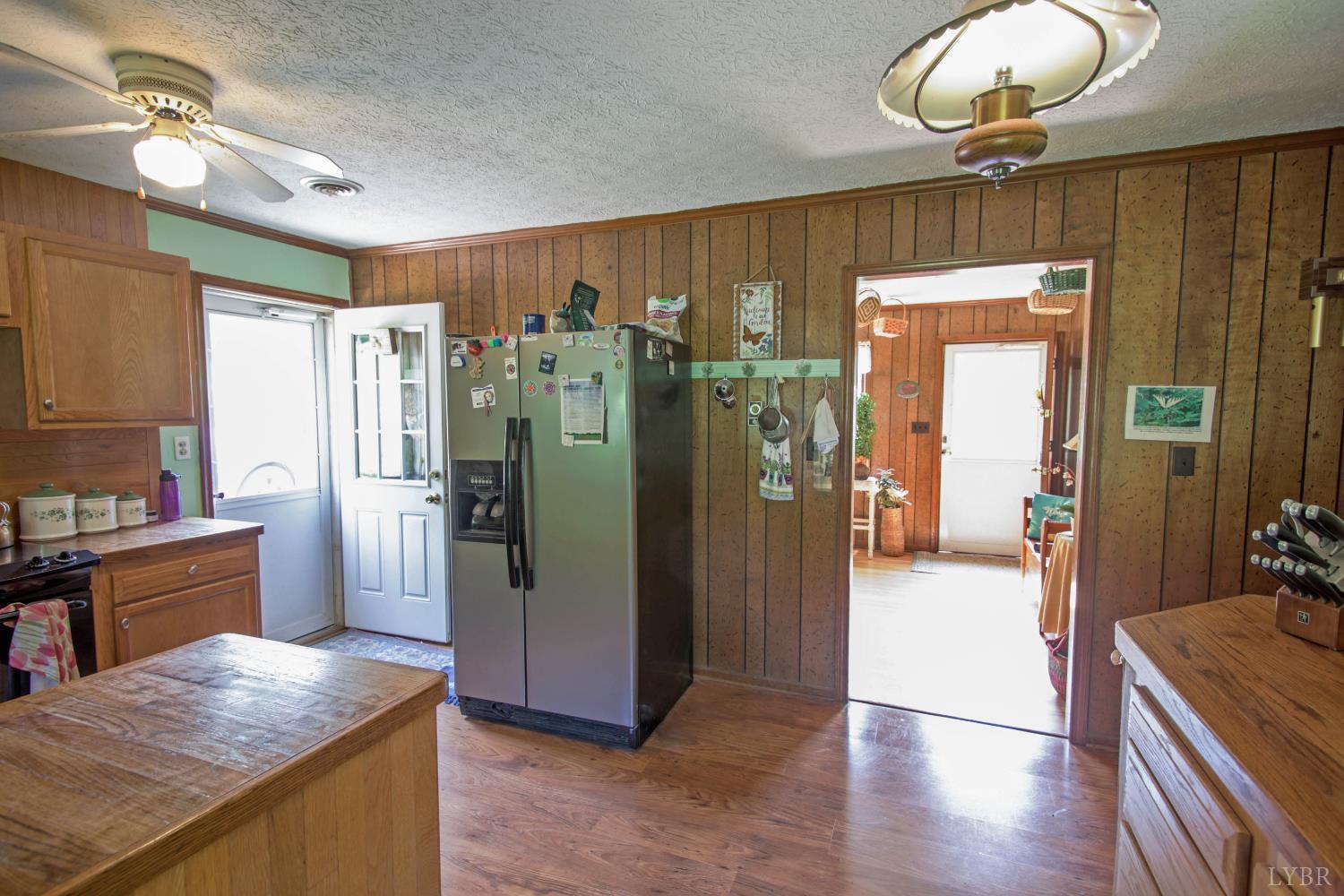 1494 Buffalo Mill Road Evington, VA 24550 - Photo 8 of 75 a view of a kitchen cabinets and a wooden floor