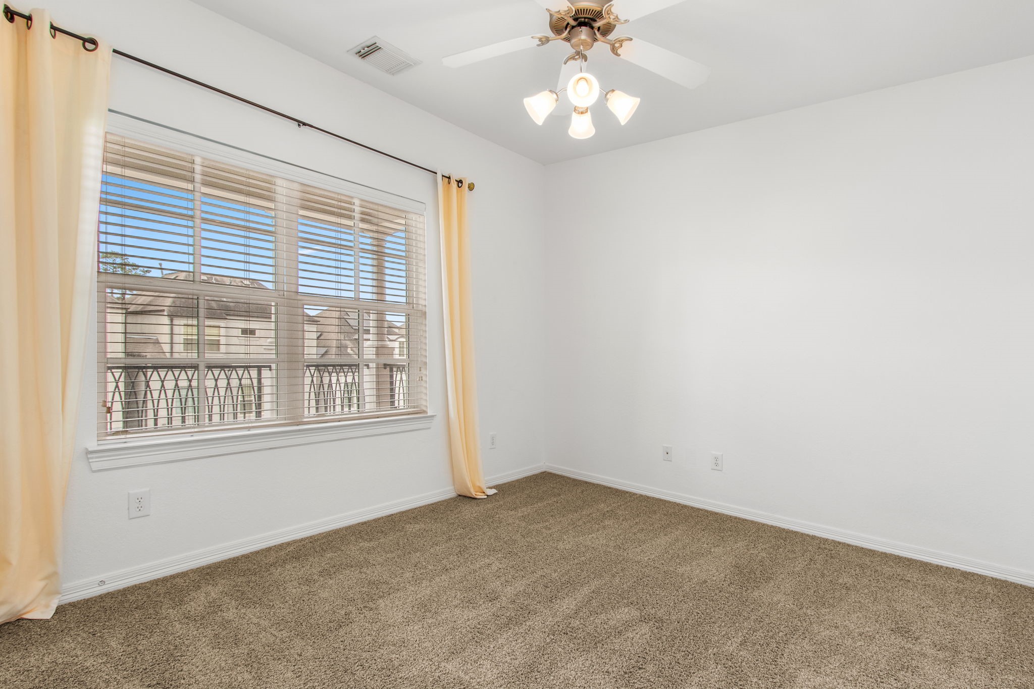 70 Shell Port Square The Woodlands, TX 77380 - Photo 26 of 50 an empty room with a window