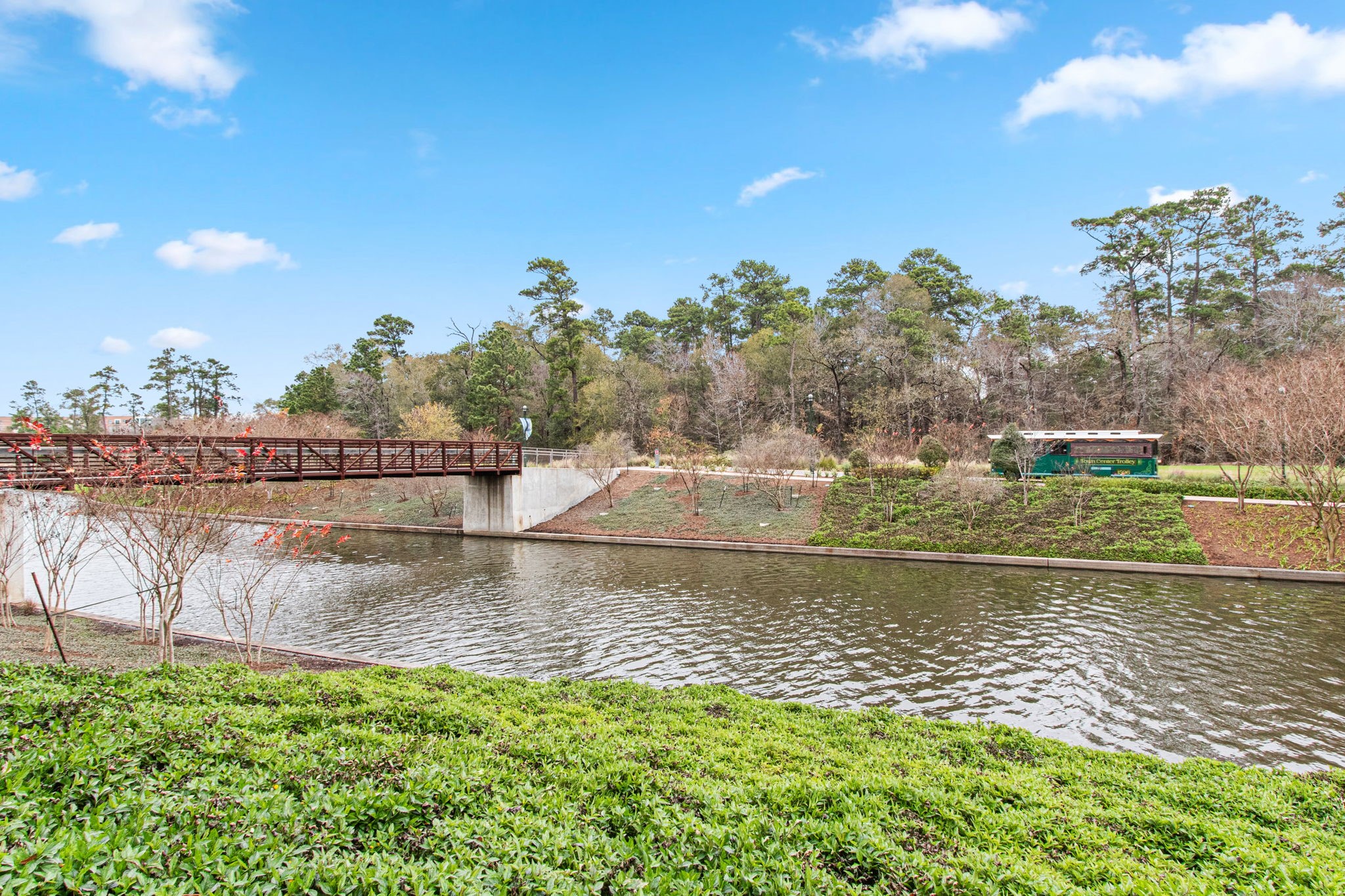 70 Shell Port Square The Woodlands, TX 77380 - Photo 41 of 50 a view of a lake with houses in the back