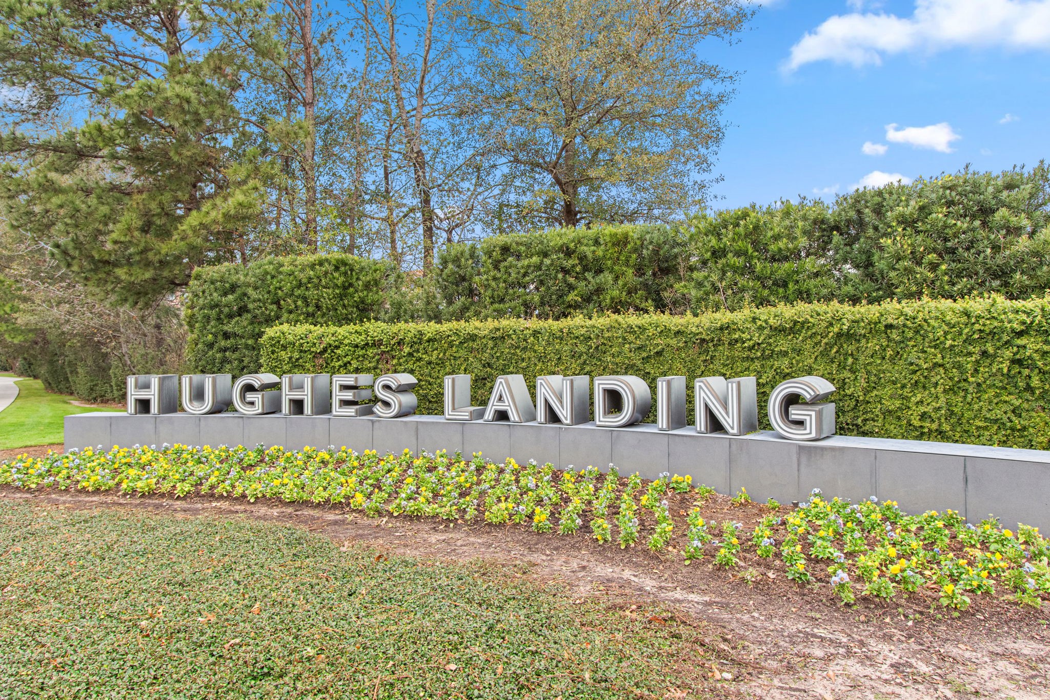 70 Shell Port Square The Woodlands, TX 77380 - Photo 47 of 50 a view of a sign board with street
