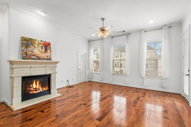 a view of kitchen with cabinets and wooden floor